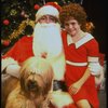 Mary K. Lombardi as Annie w. Santa Claus and Sandy in a scene from the Chicago production of the musical "Annie."