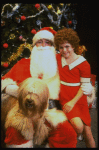 Mary K. Lombardi as Annie w. Santa Claus and Sandy in a scene from the Chicago production of the musical "Annie."