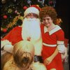 Mary K. Lombardi as Annie w. Santa Claus and Sandy in a scene from the Chicago production of the musical "Annie."