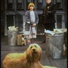 Mary K. Lombardi as Annie w. Sandy and a policeman in a scene from the Chicago production of the musical "Annie."