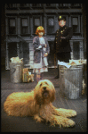 Mary K. Lombardi as Annie w. Sandy and a policeman in a scene from the Chicago production of the musical "Annie."