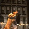 Mary K. Lombardi as Annie w. Sandy and a policeman in a scene from the Chicago production of the musical "Annie."