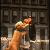 Mary K. Lombardi as Annie w. Sandy and a policeman in a scene from the Chicago production of the musical "Annie."