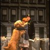 Mary K. Lombardi as Annie w. Sandy and a policeman in a scene from the Chicago production of the musical "Annie."