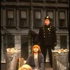 Mary K. Lombardi as Annie w. Sandy and a policeman in a scene from the Chicago production of the musical "Annie."