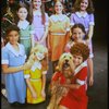 Mary K. Lombardi as Annie w. Sandy (R) and orphans in a scene from the Chicago production of the musical "Annie."