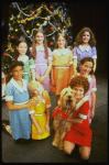 Mary K. Lombardi as Annie w. Sandy (R) and orphans in a scene from the Chicago production of the musical "Annie."