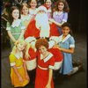 Mary K. Lombardi as Annie w. Santa Claus and orphans in a scene from the Chicago production of the musical "Annie."