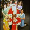 Mary K. Lombardi as Annie w. Santa Claus and orphans in a scene from the Chicago production of the musical "Annie."