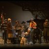 Mary K. Lombardi as Annie w. Sandy and Hooverville-ites in a scene from the Chicago production of the musical "Annie."