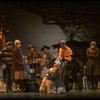 Mary K. Lombardi as Annie w. Sandy and Hooverville-ites in a scene from the Chicago production of the musical "Annie."