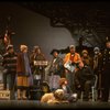 Mary K. Lombardi as Annie w. Sandy and Hooverville-ites in a scene from the Chicago production of the musical "Annie."