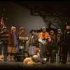 Mary K. Lombardi as Annie w. Sandy and Hooverville-ites in a scene from the Chicago production of the musical "Annie."