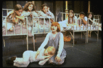 Actress Mary K. Lombardi as Annie (C) w. orphans in a scene from the Chicago production of the musical "Annie."