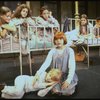 Actress Mary K. Lombardi as Annie (C) w. orphans in a scene from the Chicago production of the musical "Annie."