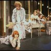 Mary K. Lombardi as Annie and Ruth Kobart as Miss Hannigan w. orphans in a scene from the Chicago production of the musical "Annie."