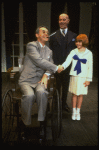 Mary K. Lombardi as Annie, Norwood Smith as Daddy Warbucks and Stephen Everett as FDR in a scene from the Chicago production of the musical "Annie."