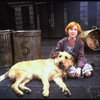 Allison Smith as Annie w. Sandy in a scene from the Broadway production of the musical "Annie."