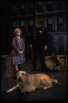 Allison Smith as Annie w. Sandy and a policeman in a scene from the Broadway production of the musical "Annie."
