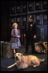 Allison Smith as Annie w. Sandy and a policeman in a scene from the Broadway production of the musical "Annie."