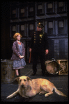 Allison Smith as Annie w. Sandy and a policeman in a scene from the Broadway production of the musical "Annie."