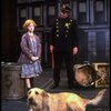 Allison Smith as Annie w. Sandy and a policeman in a scene from the Broadway production of the musical "Annie."
