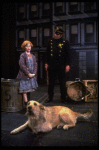 Allison Smith as Annie w. Sandy and a policeman in a scene from the Broadway production of the musical "Annie."