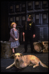 Allison Smith as Annie w. Sandy and a policeman in a scene from the Broadway production of the musical "Annie."