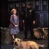 Allison Smith as Annie w. Sandy and a policeman in a scene from the Broadway production of the musical "Annie."