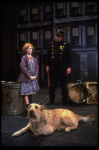 Allison Smith as Annie w. Sandy and a policeman in a scene from the Broadway production of the musical "Annie."