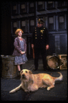 Allison Smith as Annie w. Sandy and a policeman in a scene from the Broadway production of the musical "Annie."