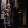 Allison Smith as Annie and Alice Ghostley as Miss Hannigan w. a policeman in a scene from the Broadway production of the musical "Annie."