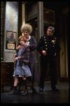 Allison Smith as Annie and Alice Ghostley as Miss Hannigan w. a policeman in a scene from the Broadway production of the musical "Annie."