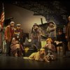 Allison Smith as Annie w. Sandy and Hooverville-ites in a scene from the Broadway production of the musical "Annie."