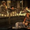Allison Smith as Annie (L) w. orphans in a scene from the Broadway production of the musical "Annie."