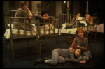 Allison Smith as Annie (L) w. orphans in a scene from the Broadway production of the musical "Annie."
