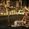 Allison Smith as Annie (R) w. orphans in a scene from the Broadway production of the musical "Annie."