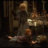 Alice Ghostley as Miss Hannigan and Allison Smith as Annie w. orphans in a scene from the Broadway production of the musical "Annie."