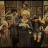Alice Ghostley as Miss Hannigan w. orphans in a scene from the Broadway production of the musical "Annie."