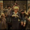Alice Ghostley as Miss Hannigan w. orphans in a scene from the Broadway production of the musical "Annie."