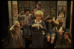 Alice Ghostley as Miss Hannigan w. orphans in a scene from the Broadway production of the musical "Annie."