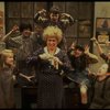 Alice Ghostley as Miss Hannigan w. orphans in a scene from the Broadway production of the musical "Annie."