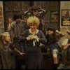 Alice Ghostley as Miss Hannigan w. orphans in a scene from the Broadway production of the musical "Annie."