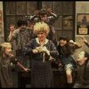 Alice Ghostley as Miss Hannigan w. orphans in a scene from the Broadway production of the musical "Annie."