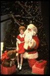 Allison Smith as Annie w. Santa Claus in a scene from the Broadway production of the musical "Annie."