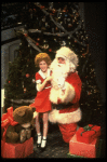 Allison Smith as Annie w. Santa Claus in a scene from the Broadway production of the musical "Annie."