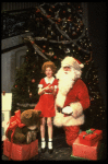 Allison Smith as Annie w. Santa Claus in a scene from the Broadway production of the musical "Annie."