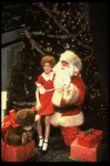 Allison Smith as Annie w. Santa Claus in a scene from the Broadway production of the musical "Annie."