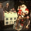 Allison Smith as Annie (C) w. Santa Claus and orphans in a scene from the Broadway production of the musical "Annie."