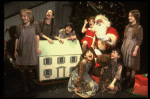 Allison Smith as Annie (C) w. Santa Claus and orphans in a scene from the Broadway production of the musical "Annie."